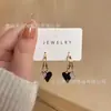 Pendientes de circonita con forma de estrella y perla de moda para mujer, diseño de nicho, pendientes de lujo ligeros de alta gama, elegantes pendientes de celebridades que combinan con todo.