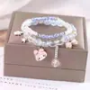 Libro Caperucita Roja Mismo Estilo Estudiante Pulsera de Glaseado de Palomitas de Maíz Hecha a Mano con Cuentas Dibujos Animados Cristal Pulsera Infantil Venta al por Mayor Cajas de Regalo