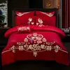 Juego de ropa de cama de lujo estilo chino, hecho de algodón 100% de fibra larga, un juego de cuatro piezas que incluye una sábana y una funda de edredón de algodón puro rojo, perfecto para la alcoba de una recién casada.