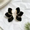 Pendientes de mariposa con borde dorado y esmalte de lujo de nicho transfronterizos, versátiles y elegantes, al por mayor