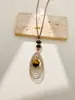 Corrente de Suéter Outono e Inverno Pingente de Pedra Olho de Tigre Natural Estilo Retro Luxo Leve Design de Nicho Versátil Elegante Longo para Mulheres