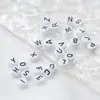 Venta caliente transfronteriza abalorios hechos a mano DIY 100 piezas/paquete letra única abalorios planos pulsera collar letra personalizada abalorios sueltos