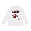 Marca moderna de estilo japonês com estampa de desenho animado de cabeça de macaco, nova blusa de moletom casual de gola redonda em terry de corte solto para homens e mulheres, adequada para adolescentes no outono e inverno