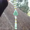 Esmalte de color lingote de jade verde estatua de Buda colgante para coche adornos para espejo retrovisor exquisito colgante para coche de Bodhisattva borla con cuentas fabricante