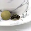 Fabricante 17MM aleación cabeza oscilante correa de botón de mezclilla hebilla de pantalón de mezclilla hebilla redonda hebilla metálica en forma de I
