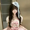 Mini sombrero lindo con cadena de lazo cruzado en rosa, tocado dulce Lolita, accesorio versátil y encantador