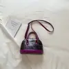 Bolso Pequeño para Mujer 2026 Primavera Nueva Moda Retro Bolso de Mano Forma de Concha Bolso Cruzado de Hombro Simple Casual Bolso de Mujer