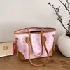 Bolso de mano de gran capacidad para mujer, nuevo diseño de moda primavera 2026, bolso de hombro sencillo, bolsa de mano tipo tote con estampado lindo para el trabajo