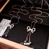 Collar con Colgante Ajustable de Lazo de Zirconia, Exquisito y Versátil, Cadena para Suéter de Estilo Lujo Ligero, Joyería de Nicho de Diseñador para Mujeres