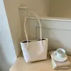 Shuai Mi Jia bolso retro de moda simple de gran capacidad madre-hija 2026 nuevo bolso de mano casual bolso de hombro para el trabajo