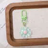 Resina de dopamina girasol llavero hebilla de puerta colgante accesorio DIY versátil creativo decoración de bolsa