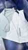 240823001 Versión Extranjera Chaqueta Cortavientos Casual Versátil Reversible para Pareja