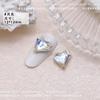 12 x 13 arte de uñas de corazón torcido de cristal joyería de diamante puntiagudo de corazón torcido hielo a través de explosiones amor Super Flash taladro de uñas al por mayor