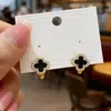 Brincos de Flor de Trevo de Quatro Folhas Banhados a Ouro Real 2025 Novos Brincos da Moda Fashion de Celebridade da Internet Micro-Incustados com Zircônia Brilhante Brincos de Trevo da Sorte
