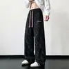 Calça masculina de veludo cotelê com estampa de letras coloridas, coleção de outono, perna reta, corte solto, design de perna larga fluido, moderna e versátil, calça casual tie-dye