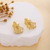 Aretes de moda de lujo ligero europeo y americano, de alta gama, estilo metálico, temperamento simple, aretes cruzados irregulares de amor y estrella transfronterizos