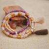 Joyería transfronteriza Bohemio playa viento oceánico cuerda elástica pulsera multicapa borla estilo étnico pulsera de cuentas de arroz mujeres