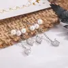 Brincos de Pérola com Franja Coração Estilo Quente e Macio para Meninas Brincos para Mulheres Design Pequeno com Senso de Estilo Brincos Nicho Distintivos