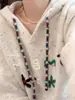 Suéter com capuz em crochê com letras na cor damasco, estilo coreano, para mulheres, adequado para outono e inverno, blusa de tricô solta e casual para pessoas baixinhas