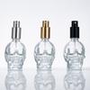 Botella de perfume de vidrio con forma de calavera botella vacía 50 ml en stock suministro 18 tornillo cosmético botella de vidrio portátil