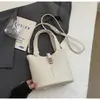 Bolso Cubo de Nicho Estilo Coreano para Mujer Nuevo Modelo 2026 con Acabado de Alta Gama, Bolso de Mano Sencillo con Patrón de Lichi, Bolso de Hombro y Cruzado de Lujo Ligero