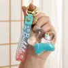 Chaveiro de estrela de cinco pontas com óleo e areia movediça, unicórnio acrílico, ornamentos criativos para carro, chaveiro de mochila feminina