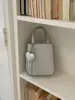 Bolsa pequeña para teléfono móvil para mujer, nuevo modelo de verano 2025, bolso cruzado, casual, simple, elegante, bolsa cuadrada pequeña para viajar