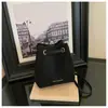 Bolsa de mão transfronteiriça de comércio exterior da moda para mulheres, nova bolsa de balde retrô de tecido escovado para o dia a dia, bolsa de ombro e transversal estilosa
