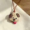Encantador perrito peludo con la lengua fuera, llavero para bolso, colgante de dibujos animados natural, semillas de terapia de sonido curativas, popular en zonas escénicas, amuleto divertido y adorable