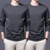 Camiseta de manga larga para hombre, capa interior de otoño para hombre, camiseta base elástica de corte holgado, camiseta estampada estilo coreano ins para hombre
