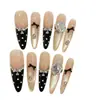 Otoño e Invierno Nuevas Uñas Largas Delgadas con Forma de Perro Piezas de Uñas Producto Terminado Fabricante Mayorista Uñas Usables Negras Calcomanías para Uñas con Lunares Lindos