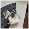 Bolso pequeño popular de textura tejida transfronterizo, nuevo estilo para mujer, coreano, nicho, bolso cubo para ir al trabajo, versátil para exteriores, de un solo hombro, cruzado