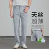 Jeans de hombre ultradelgados de Tencel, corte recto holgado, pantalones largos de seda helada, nuevo modelo de otoño, pantalones casuales elásticos de seda para hombre