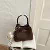 Bolsa Cesta de Legumes Feminina 2026 Nova Versátil Bolsa de Ombro Único Moda Bolsa de Balde de Mão Design de Nicho Bolsa Transversal