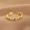 Popular Europea y Americana Aliexpress Ebay Moda Anillo Serie Ojo del Diablo Incrustado de Circonita Joyería de Mano Abierta Ojos Azules para Mujer