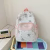 Mochila para mujer modelo nuevo 2026 transfronteriza, estilo coreano, alto atractivo estético, mochila escolar para estudiantes de secundaria y preparatoria, linda y de gran capacidad