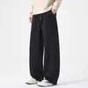 Nuevo producto de otoño e invierno para hombres de talla grande: Pantalones casuales curvos de longitud extendida, holgados y versátiles, adecuados para hombres altos, pantalones de chándal casuales de pierna ancha