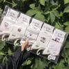 Meias Esportivas de Algodão Brancas de Cano Médio para Mulheres com Tecelagem de Mil Pés Meias Brancas Tricotadas em Máquina Integrada Frescas Fofas Doces 26 Outono