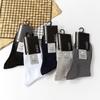 Calcetines para hombre casual de negocios calcetines de tubo transpirables absorbentes de sudor calcetines de hombre fabricantes fuente mayoreo otoño e invierno calcetines de tubo para hombre negros
