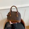 Otoño 2026 Nuevo Bolso de Mano Bolso Concha Estilo Retro Lujo Ligero Moda Tendencia Versátil Bolso de Hombro Cruzado Bolso para Mujer