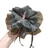 Estilo perezoso 2026 nuevo coletero de oso con pompón y diseño floral, accesorio para el cabello retro y de alta gama para mujeres