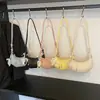 Bolsa Exclusiva de Cor Pura para Mulheres 2025 Nova Popular de Verão Grande Capacidade Bolsa Transversal Bolsa de Ombro Chifre Bolsa de Axila