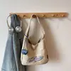 Bolso de Hombro Único de Lona para Mujer Versátil Gran Capacidad Bolso Cubo para Viajes Diarios Bolso de Mano Tote Casual Comercio Exterior Transfronterizo