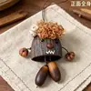 Campana de Agua Natural Cáscara de Fruto de Alcanfor Colgante de Dibujos Animados Carrillón de Viento Terminado Bolsa de Semillas Curativas Decoración Popular en Zonas Turísticas Llavero Lindo