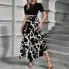 2026 Moda Feminina Cruzada Primavera e Verão Vestido Estampado Floral Quente Venda Redondo Decote Estilo Férias Exóticas Vestido Elegante