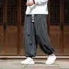 Nuevos pantalones de linterna a rayas texturizados estilo chino para hombre con cordón en la cintura elástica y pernera cónica tipo harén, estilo chino retro, pantalones para hombre de talla grande