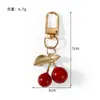 Llavero Colgante de Cereza Frutal Transparente Brillante Europeo y Americano Transfronterizo Llavero de Cereza Brillante Decoración para Bolso de Mujer Regalo