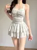 Traje de baño de una pieza estilo nuevo 2026 para mujer, Verano Sexy Estilo Falda Floral Conservador para Ocultar el Vientre Adelgazante de Cuello Halter Ropa de Baño para Estudiantes de Aguas Termales