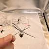 En stock accesorios para el cabello de lazo de cuero PU accesorios para ropa con colgante de corazón hecho a mano DIY decoración de medias caja de regalo
