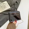 Bolsa Feminina Vintage Primavera 2026 Nova Brilhante Tendência Exclusiva Fivela de Fecho Bolsa Transversal Bolsa de Mão Feminina Moda